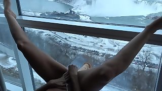 HOT AMATEUR WIFE FUCKING LARGE DILDO ON WINDOW ABOVE THE \