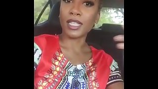 Ebony milf plays with her pussy in car